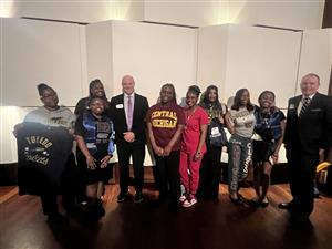 Students in college shirts
